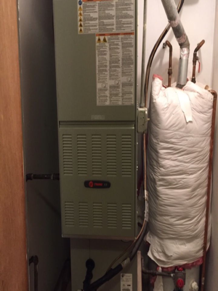 Performing a winter tune-up on Trane 80% down flow furnace. in W Touhy Ave, Lincolnwood, IL, USA.