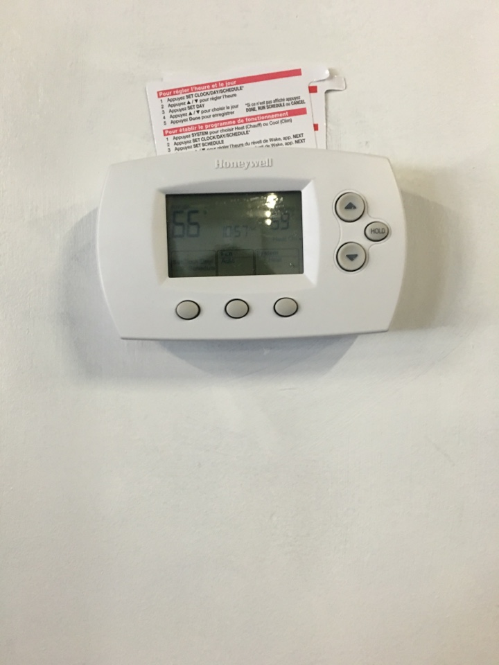 Installing a Honeywell thermostat  in Mansfield Ave, Morton Grove, IL, USA.